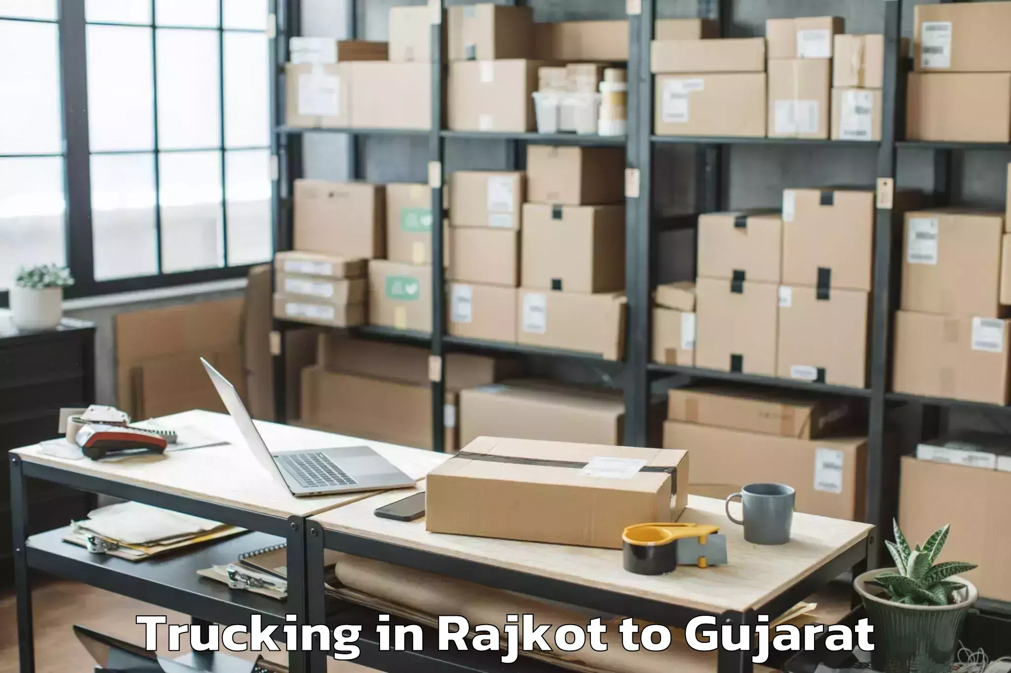 Easy Rajkot to Kavant Trucking Booking